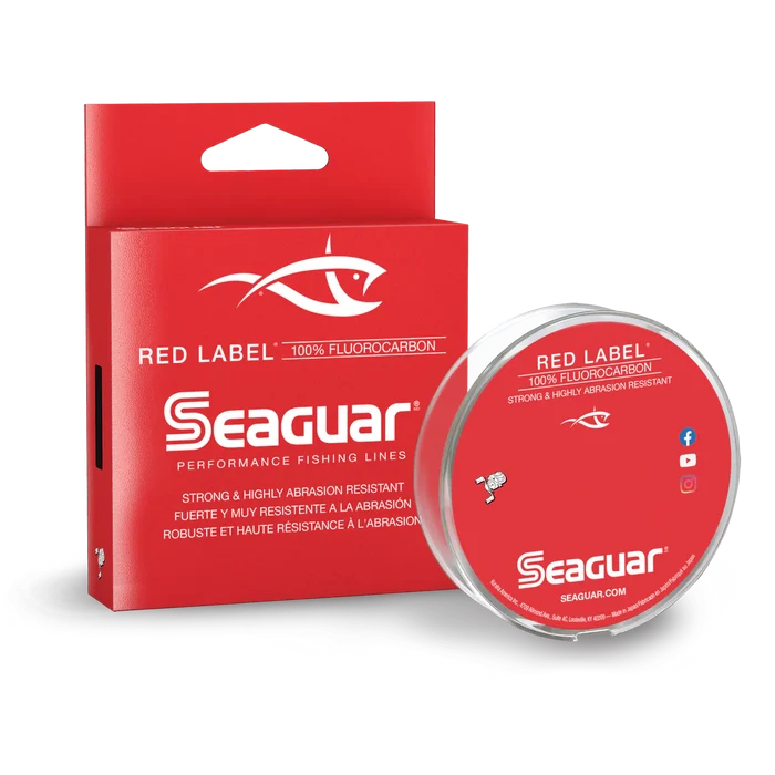 Seaguar Red Label Fluorocarbon fishing line packaging and spool, featuring strong, abrasion-resistant fluorocarbon material suited for fishing tackle and marine use.
