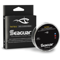 Seaguar Tatsu Fluorocarbon - Bulk Spools fishing line packaging featuring black and white design, highlighting 100% fluorocarbon material known for strength and castability.