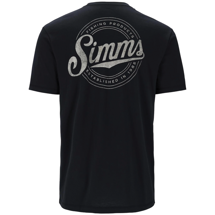 Back view of a black Simms Circle Lockup T-Shirt - Men's featuring a large circular logo print with vintage-style text reading "Simms Fishing Products Established in 1986" in light gray.