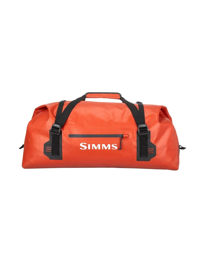 Simms Dry Creek Duffel in bright orange with black adjustable straps, a top handle, and a front zippered pocket designed for durable, water-resistant fishing tackle storage.