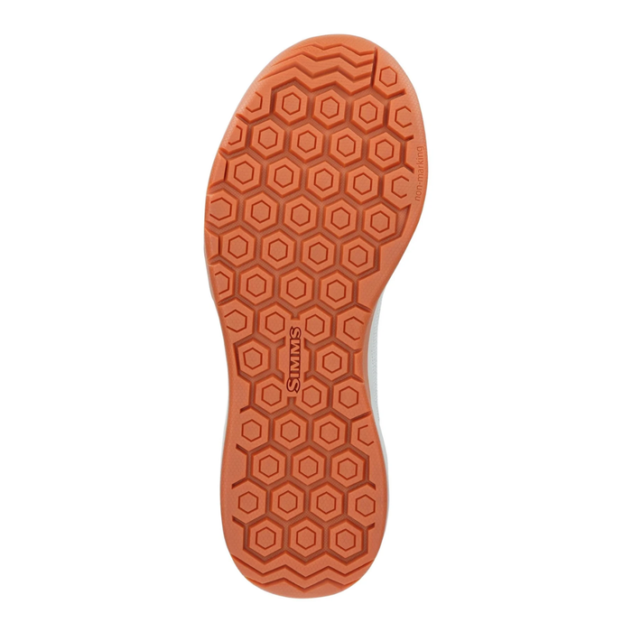 Simms Flats Sneaker - Men's orange rubber sole with hexagonal tread pattern designed for traction on wet surfaces, suitable for fishing and outdoor activities.