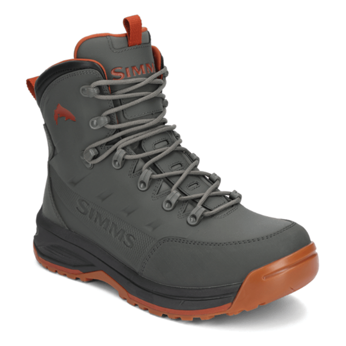 Simms FreeSalt Boots in gray with orange accents, featuring high ankle support, durable laces, and a rugged sole designed for fishing tackle and outdoor use.