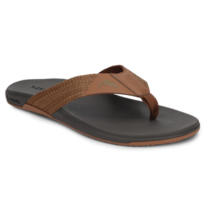 Simms Panga Flip Flops in brown and black with a comfortable cushioned footbed, durable woven straps, and a small fish emblem on the upper strap, designed for casual outdoor wear.