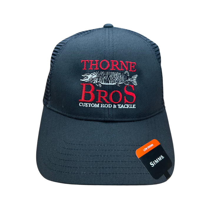 Simms Thorne Bros. Logo Trucker Hat in dark fabric with red and white embroidered Thorne Bros text and fish graphic, featuring a mesh back and low crown design.