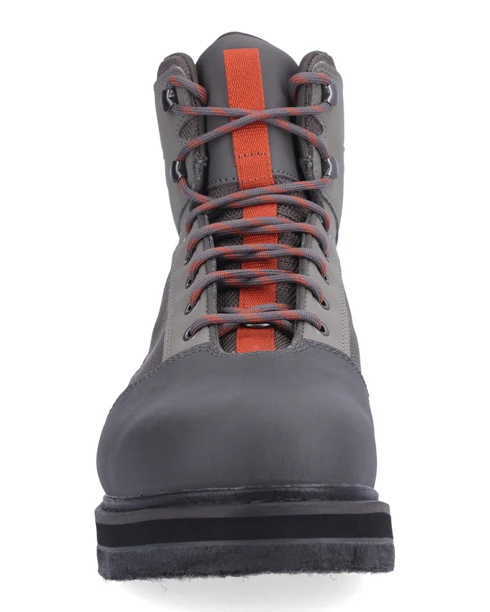 Simms Tributary Wading Boot - Felt Sole shown from front, featuring gray upper with orange accent stripe and durable felt sole designed for fishing and outdoor use.