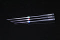 Three Smhaen Dubbing Needle tools with slender pointed tips and black handles, each marked with the brand name and featuring colored bands near the needle tips for easy identification.
