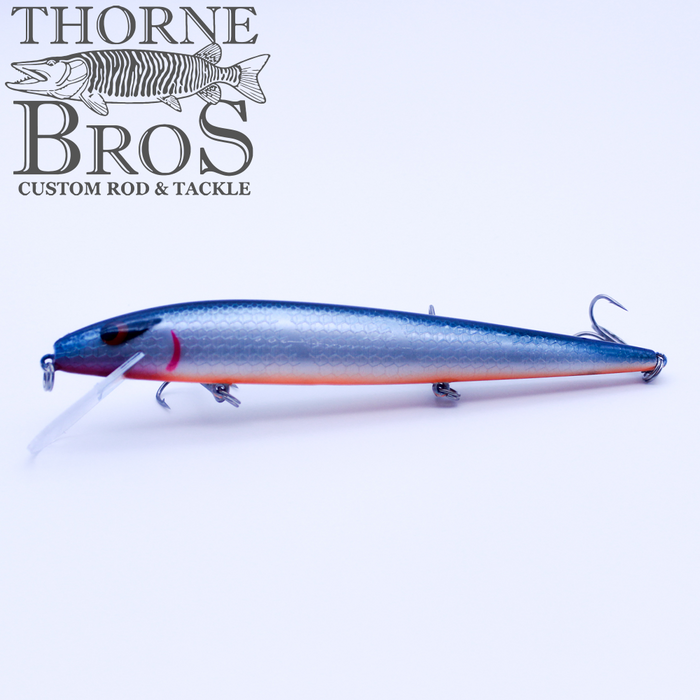 Smithwick Perfect 10 Rogue - Custom Painted Colors fishing lure with a sleek blue and silver finish, detailed scale texture, and multiple treble hooks for effective fishing tackle.