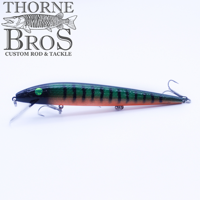Smithwick Perfect 10 Rogue - Custom Painted Colors fishing lure with a green and orange body, black vertical stripes, and two treble hooks, displayed against a white background with Thorne Bros logo.
