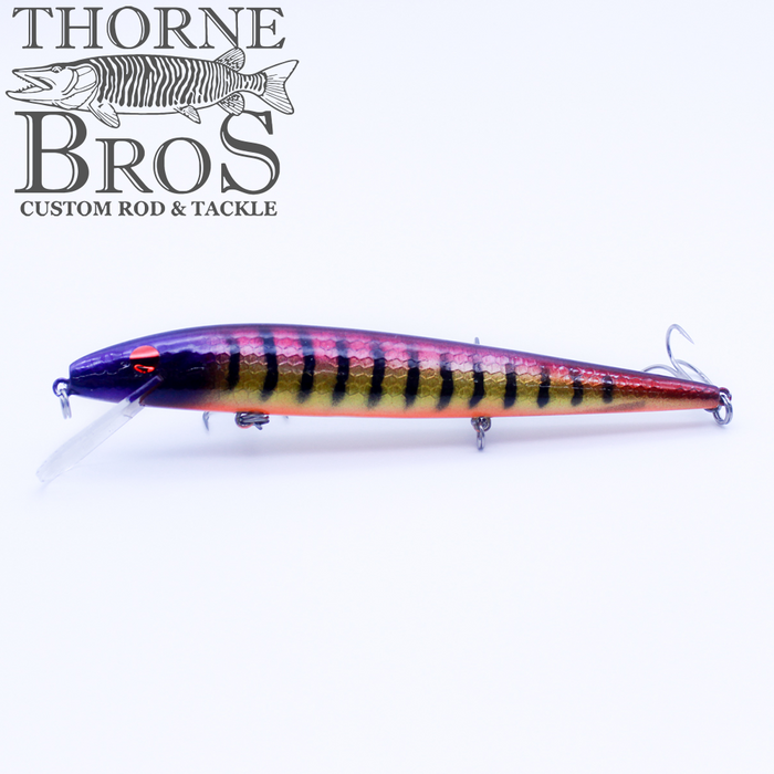 Smithwick Perfect 10 Rogue - Custom Painted Colors fishing lure with a vibrant striped pattern in yellow, black, and purple, designed for musky fishing, featuring treble hooks and a clear diving lip.