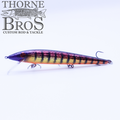 Smithwick Suspending Rattlin' Rogue - Custom Painted Colors fishing lure with a detailed yellow and purple striped body, equipped with multiple treble hooks, displayed on a white background.