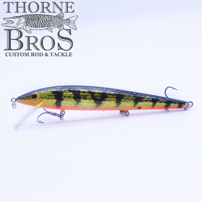 Smithwick Suspending Rattlin' Rogue - Custom Painted Colors fishing lure with a yellow, black, and orange patterned body, featuring two sharp treble hooks and a clear diving lip.