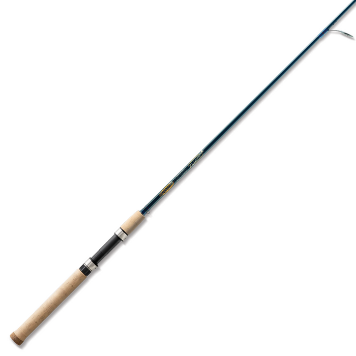St. Croix Triumph Travel - Spinning fishing rod with a cork handle, sleek black reel seat, and blue rod blank designed for portability and performance in fishing tackle.
