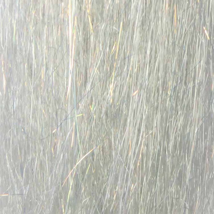 Close-up image of shimmering, pale gray synthetic fibers used for fly fishing lure materials, highlighting fine strands for detailed fishing tackle crafting with Steve Farrar SF Blend.