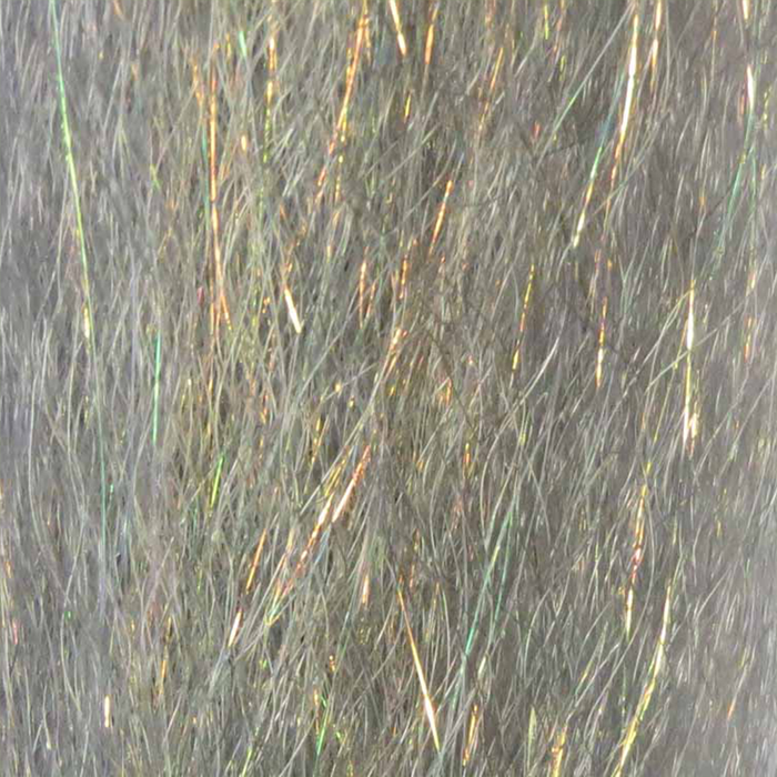 Close-up of shimmering, iridescent synthetic fibers in natural and silver tones, used as fishing lure material for Steve Farrar SF Blend fishing tackle.