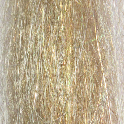 Close-up view of light brown and golden synthetic fibers used as fishing lure material named Steve Farrar SF Blend, suitable for fly tying and fishing tackle.