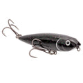 Strike King Bitsy Dawg Topwater fishing lure in black with glitter accents, featuring two treble hooks designed for freshwater musky and bass fishing.