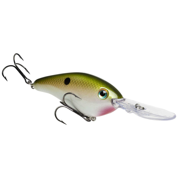 Strike King HC6XDHK (Hard Knock) fishing lure with a green and white body, detailed scale pattern, realistic eye, and two treble hooks designed for effective fishing tackle.