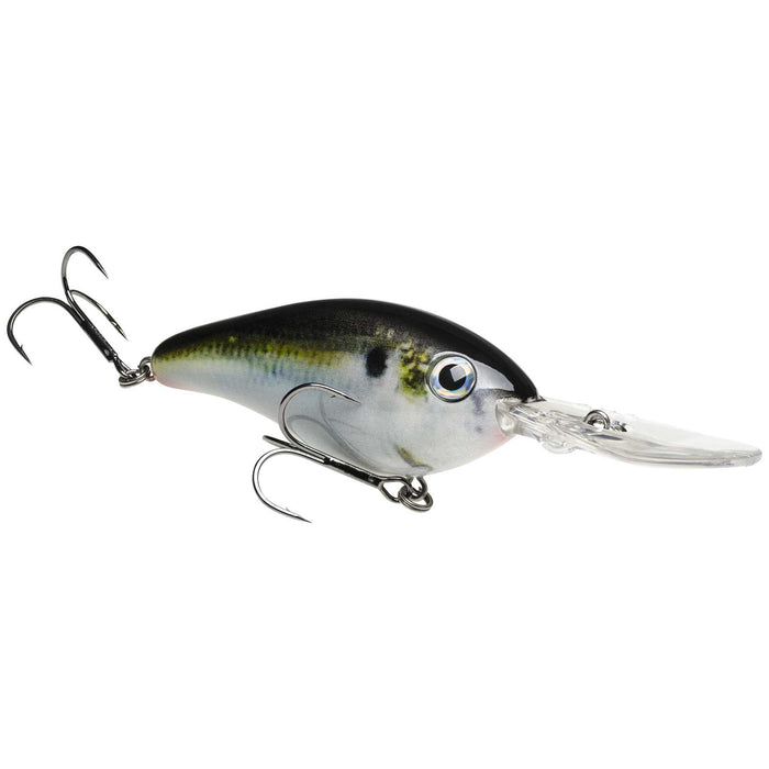 Strike King HC6XDHK (Hard Knock) fishing lure with a natural shad color pattern, featuring detailed eyes, a clear diving lip, and two treble hooks for effective fishing tackle use.