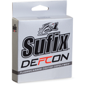 Packaging of Sufix Defcon Fluorocarbon Co-Polymer fishing line, featuring a silver box with bold black and red lettering and a graphic of a fish, designed for fishing tackle use.