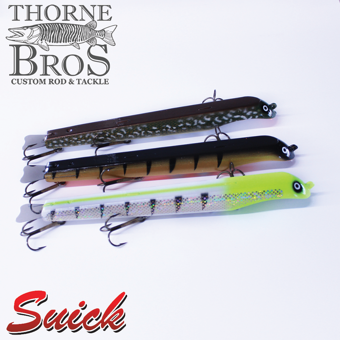 Three long fishing lures with multiple treble hooks in different colors and patterns displayed on a white background featuring the text "Suick Thriller HI 9" - TB Custom Adjustable Weights".