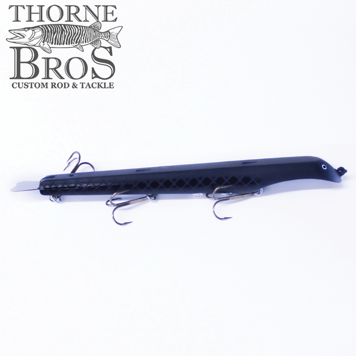 Suick Thriller HI 9" - TB Custom Adjustable Weights fishing lure in black with multiple sharp treble hooks, designed for musky fishing and customizable weight adjustments.