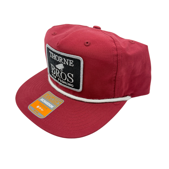 Thorne Bros Fly Fishing Logo Richardson Umpqua Gramps 256 Hat Cardinal/White, red cotton cap with white rope detail and black patch logo on front, adjustable fit.