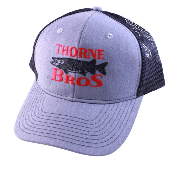 Thorne Bros. Logo Hat featuring a gray front panel with black mesh back, embroidered with red "Thorne Bros" text and a detailed musky fish graphic.