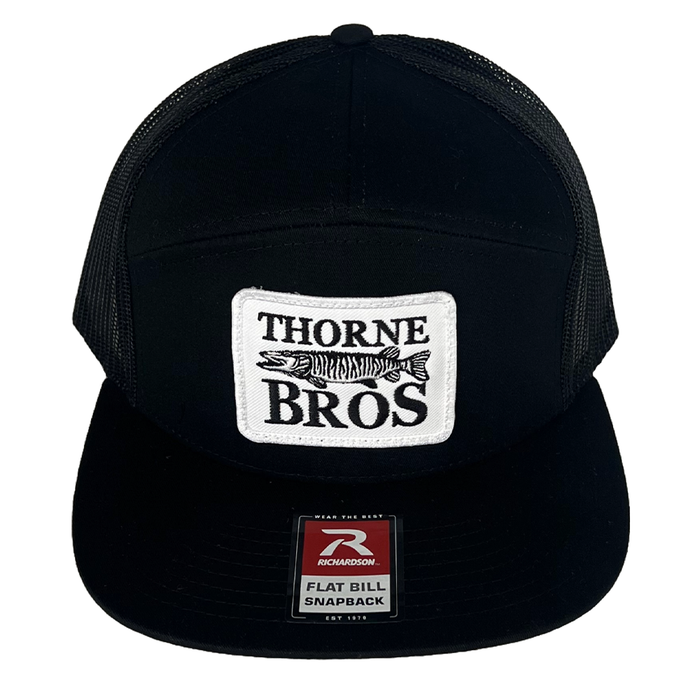Black mesh snapback cap with flat bill featuring a white rectangular patch embroidered with "Thorne Bros" and a fish graphic, labeled as Thorne Bros Richardson 168 Thorne Bros Patch.