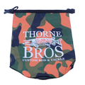 Thorne Bros. Waterproof Dry Bag in green, black, and orange camouflage pattern with a white musky fish logo and zippered top closure for fishing tackle storage.