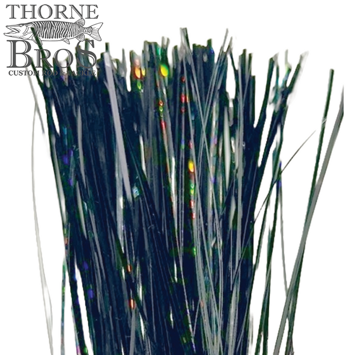 Thorne Brothers Pre-Tied Tinsel Skirt-Blended Tinsel, featuring long, thin, reflective black strands with multicolored highlights designed for fishing lures and tackle.