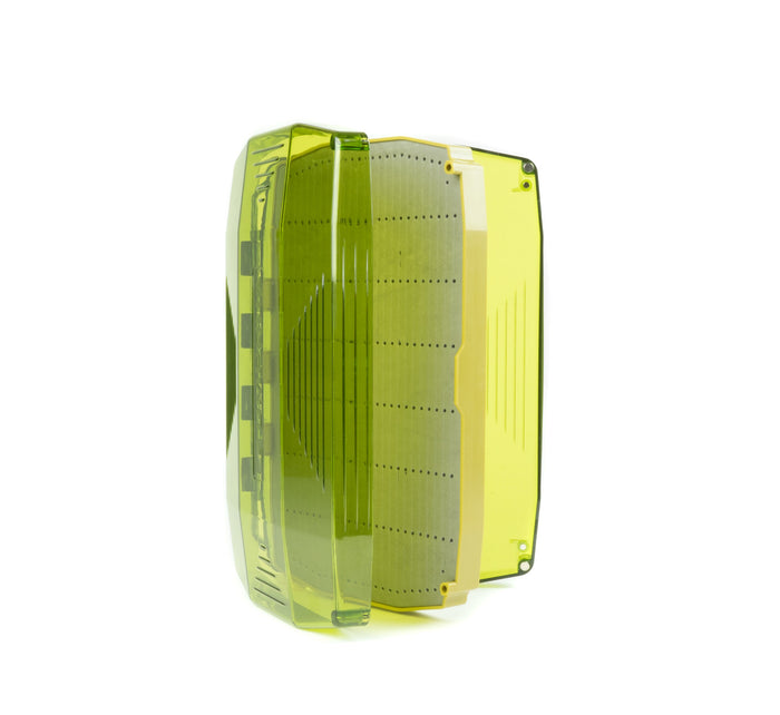 Umpqua Payload Boat Fly Box in translucent olive color, designed for organizing and storing fly fishing lures with multiple foam slots for secure placement.