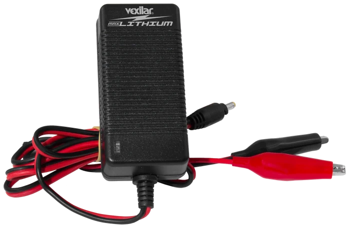 Vexilar Lithium Battery Chargers (Charger Only) featuring a compact black charger with attached red and black alligator clips and power cord, designed for marine electronics and fishing tackle power needs.