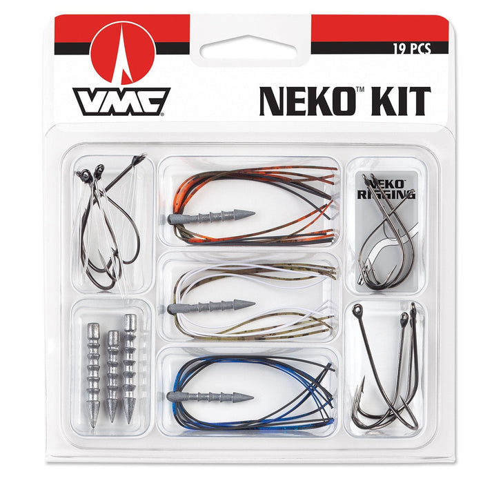VMC Neko Rigging Kit showing a clear plastic package with multiple fishing tackle components including terminal hooks, weighted rigs in orange, white, and blue colors, and additional small tackle pieces for rigging.