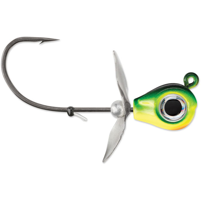 VMC Snitch Jig fishing lure featuring a green and yellow painted head with a large eye design, metal propeller blades, and a sharp single hook for fishing tackle.