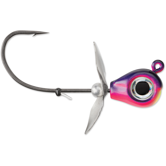 VMC Snitch Jig featuring a single black hook with a sharp barb, a metallic silver blade, and a vibrant purple and pink jig head with a large eye detail, designed for fishing tackle use.