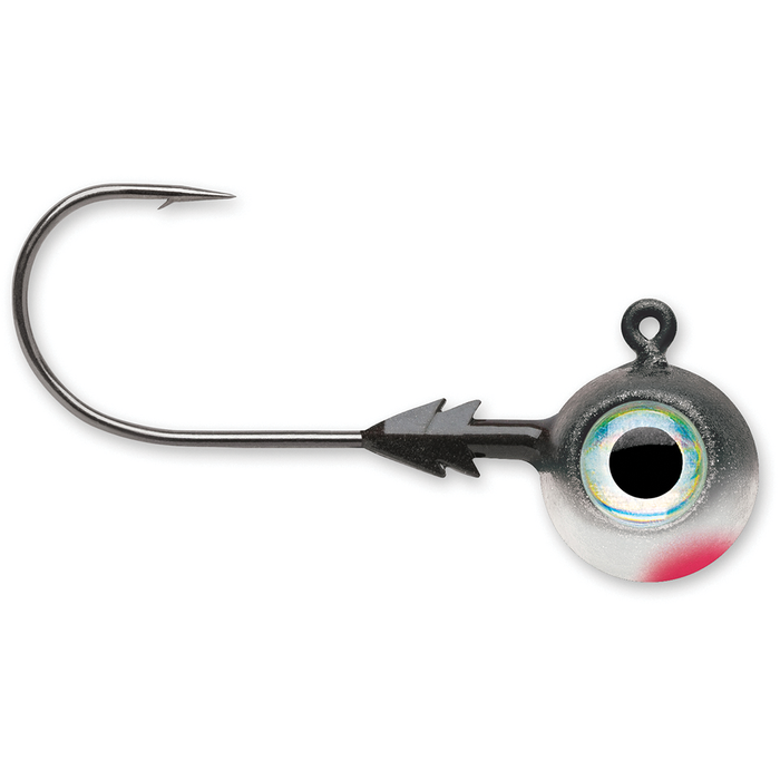 Close-up of a single VMC Tungsten Moon Eye Jig with a sharp fishing hook attached to a round, metallic painted jig head featuring a detailed eye design, used for fishing tackle.
