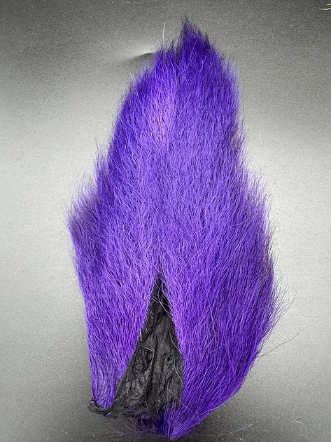 Wapsi Meduim Bucktail in vibrant purple color, showing soft, dense hair fibers commonly used for crafting fishing lures in fishing tackle and rods.