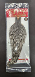 Whiting Rooster Bronze Full Dry Fly Cape in clear packaging, showing natural brown and black mottled feather pattern for fly fishing tackle.
