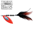 Windels Magnum Pike Harasser fishing lure with bright orange spinner blade, black and red feathered tail, and black beads, designed for musky fishing tackle.