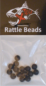 Small black fishing tackle beads designed for noise and attraction, labeled "Rattle Beads," shown in a clear plastic bag, representing X Tackle Rattle Beads.