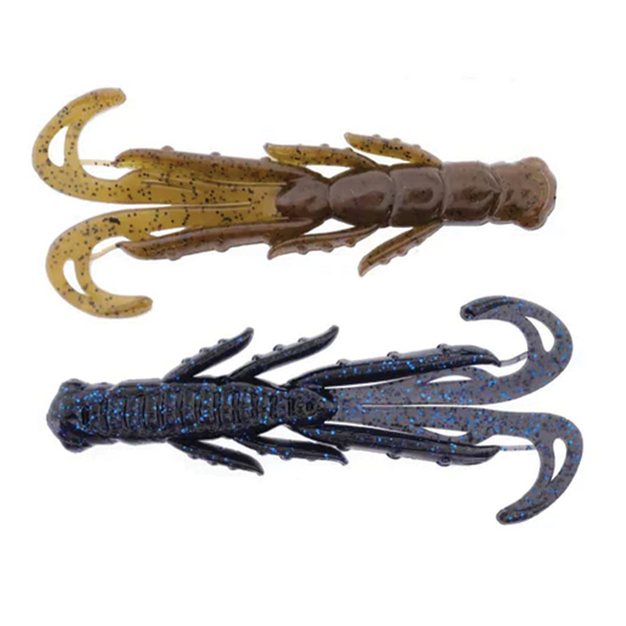 Two fishing lures shaped like small aquatic creatures, one in translucent brown with black speckles and the other in dark blue with blue speckles, labeled X-Zone Scented Stealth Creature.