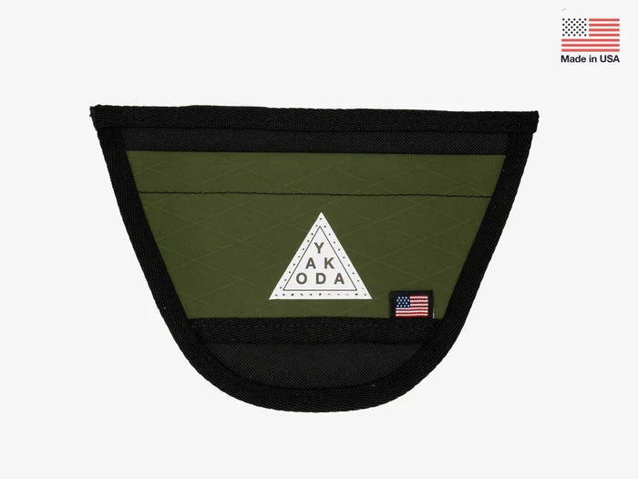 Yakoda Net Holster in olive green with black trim, designed to securely hold fishing nets, featuring durable fabric and an American flag tag for fishing tackle organization.