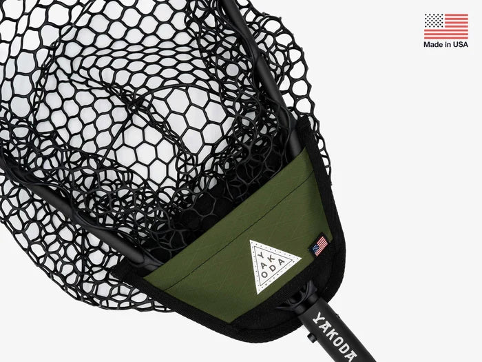 Yakoda Net Holster featuring a durable black mesh fishing net with an olive green reinforced cuff, designed for secure rod attachment and easy access during fishing.