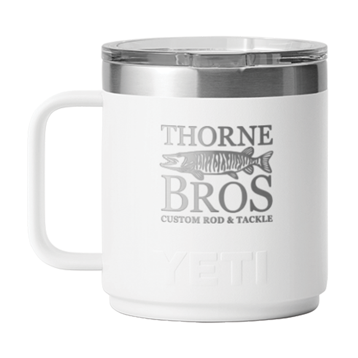 White insulated Yeti Thorne Bros. Logo Rambler 10oz. Mug with a silver magslider lid and printed logo featuring a musky fish and custom rod and tackle branding.