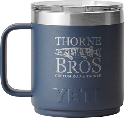 Yeti Thorne Bros. Logo Rambler 10oz. Mug - w/ MagSlider Lid in blue with a silver rim, featuring Thorne Bros. custom rod and tackle logo and Yeti branding embossed on the front.