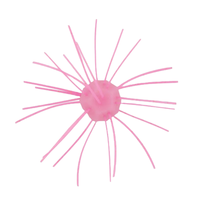 Z-Man Fuzzy Nuggetz fishing lure in pink with a soft central body and numerous flexible rubber-like strands extending outward, designed for attracting fish.